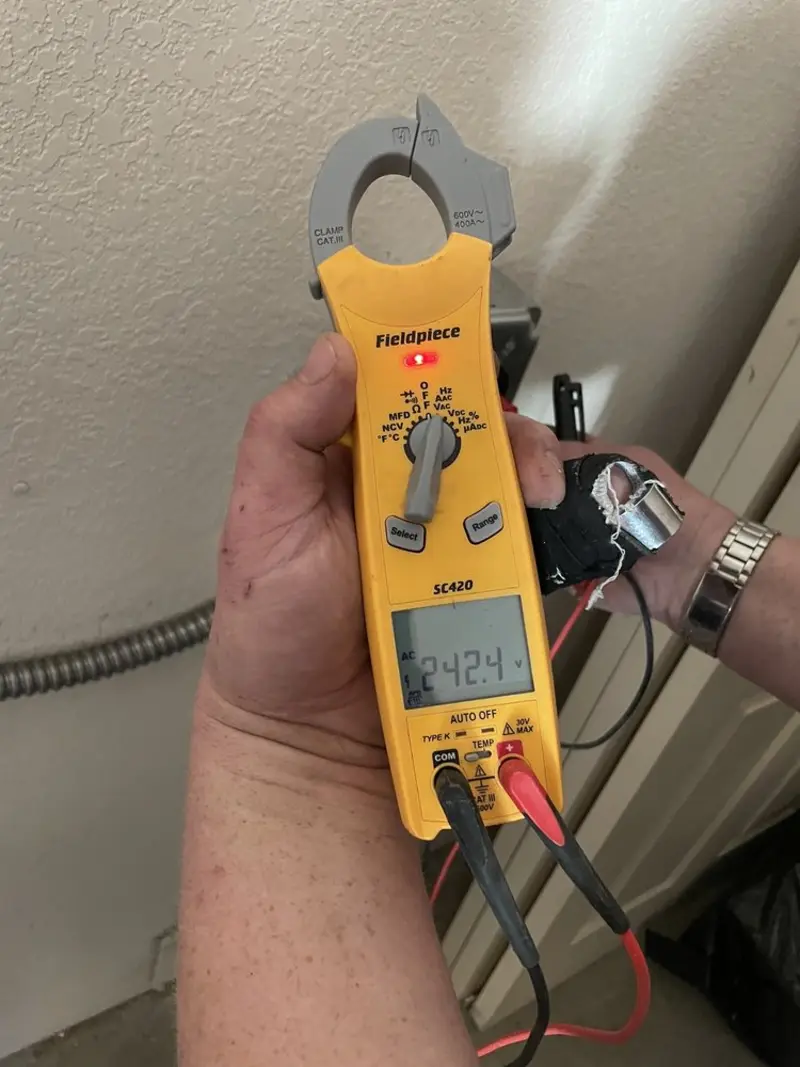 Voltage testing with clamp meter during Generator Installation in Glasgow